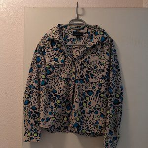 Attention multi-color animal print blouse size medium.